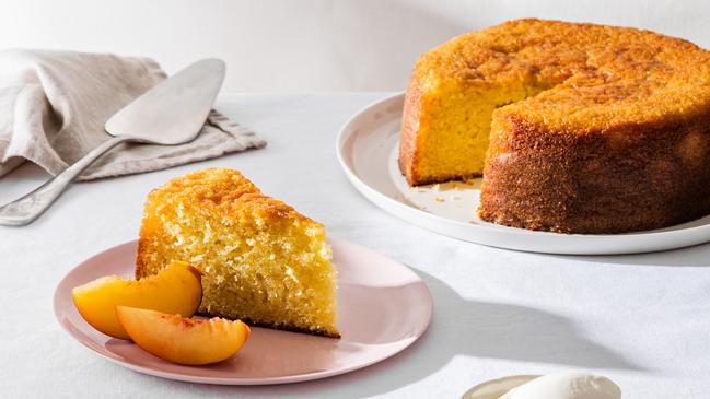 Elizabeth Hewson’s olive oil cake with fresh peaches. Picture: Nikki To