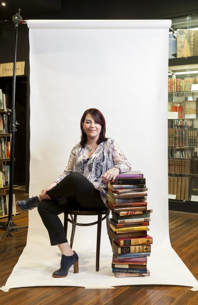 Piling on the work ... Rachael Johns has written 24 books after realising her dream of becoming an author.