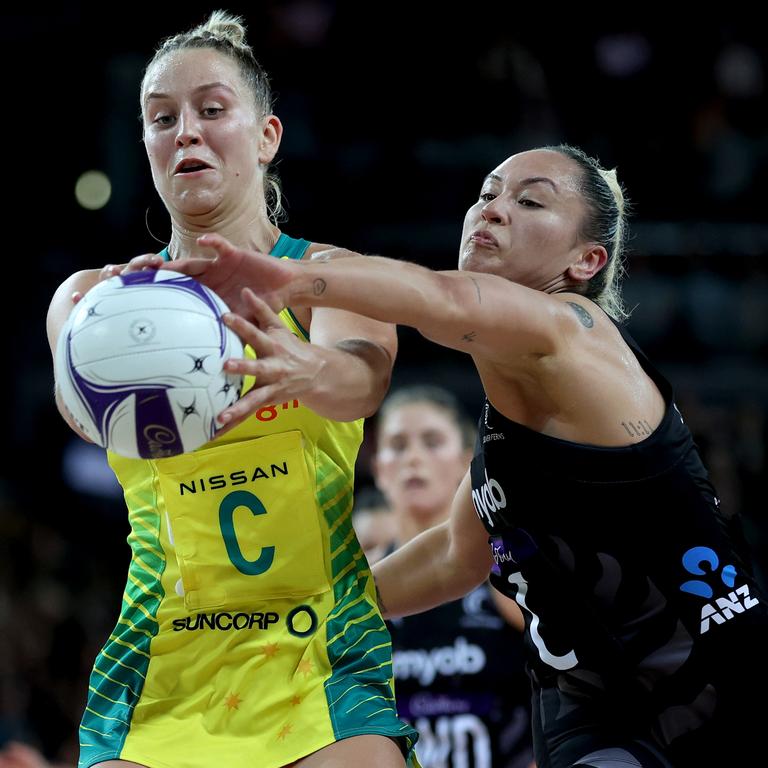 Jamie-Lee Price battles with New Zealand’s Whitney Souness.