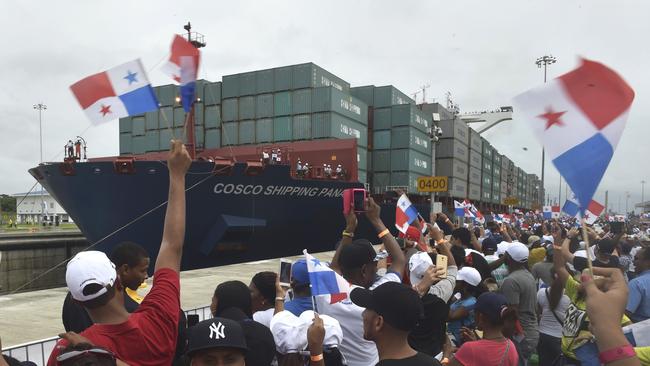 Chinese-chartered merchant ship Cosco Shipping Panama crosses the Agua Clara Locks during the inauguration of the expansion of the Canal on June 26, 2016. Picture: AFP