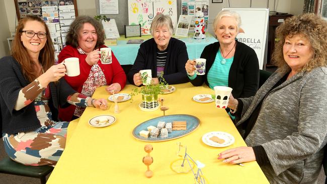 Umbrella Dementia Cafes founder Kirsty Porter (left) with volunteers. Picture: Hamish Blair