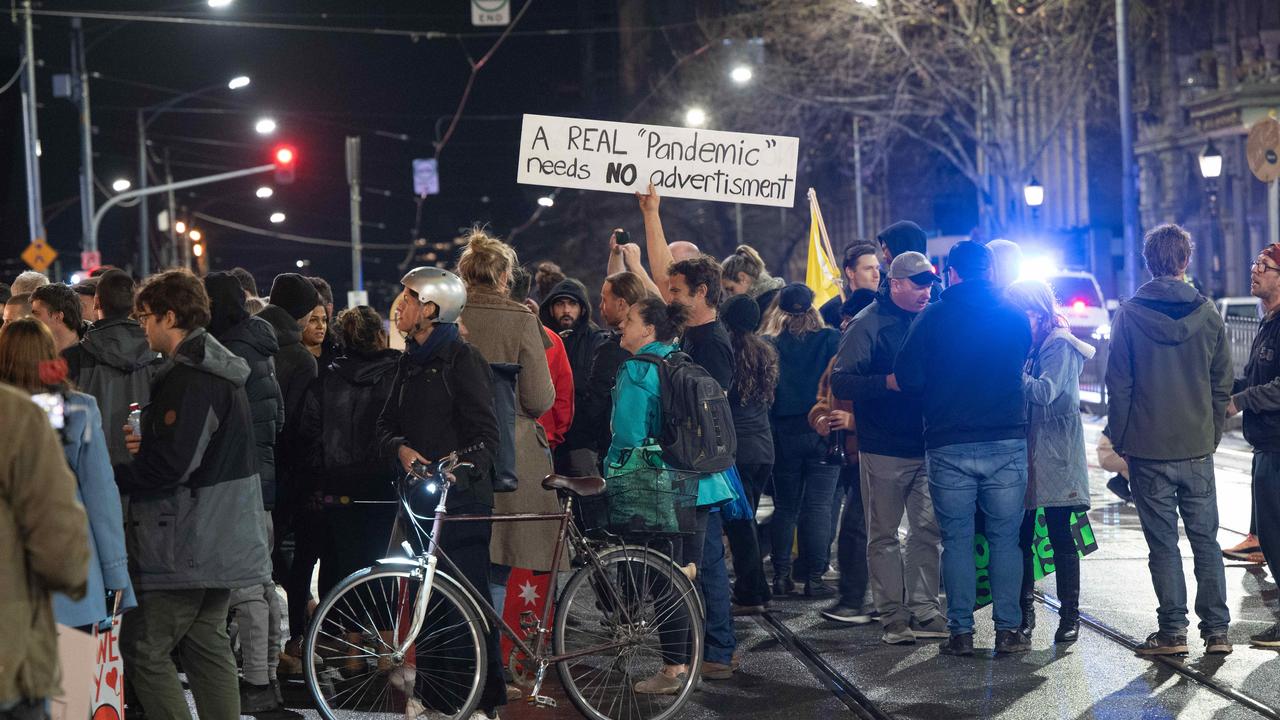 Protesters took to the streets hours before the lockdown rules came into place. Picture: Tony Gough