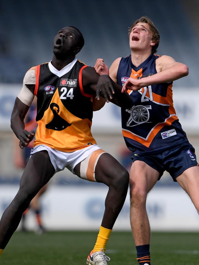 Bigoa Nyuon rucks against Essendon draftee Harrison Jones in the NAB League.