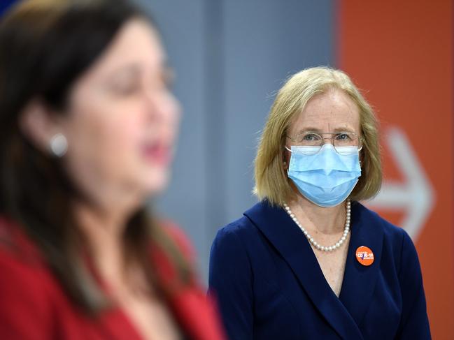 Queensland Chief Health Officer Dr Jeannette Young watches Premier Annastacia Palaszczuk speak earlier this month.