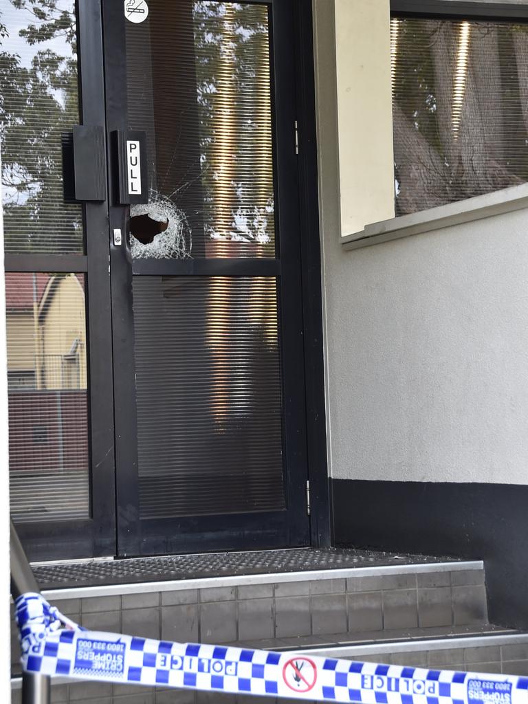 Police investigate the attempted armed robbery of the Federal Hotel in May 2019.