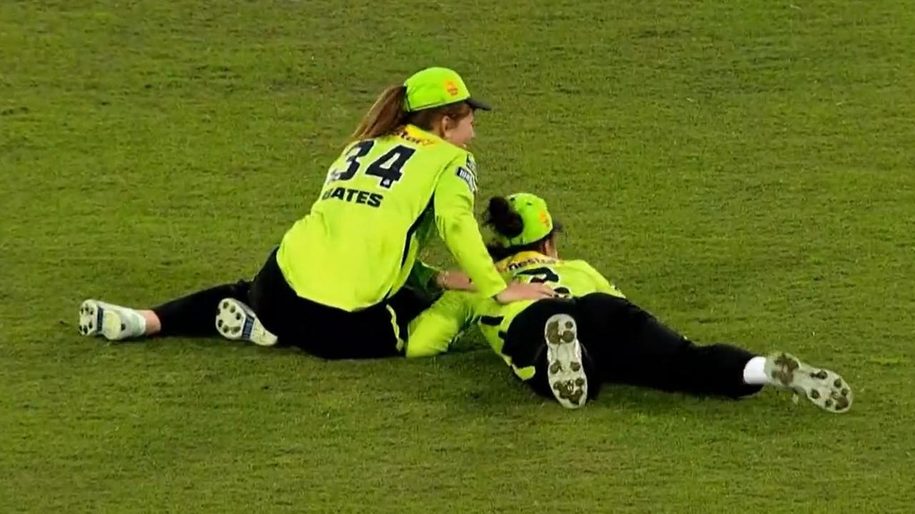 Players duck for cover as the plovers swoop during a WBBL match. Pic: Fox Sports