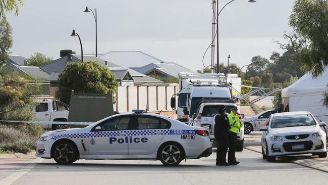 Police block off Brixton Crescent, Ellenbrook, after three people were found dead in a house. Picture: Nic Ellis / The West Australian.
