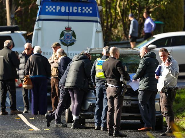 Police outside the home at Craig Rd. Picture: Ian Currie