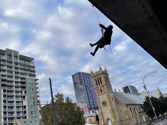 She was held up metres in the air by rope.