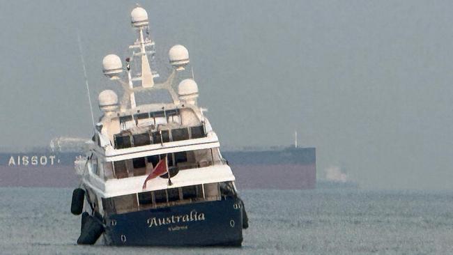 Clive Palmer's superyacht Australia runs aground off Singapore on Monday.