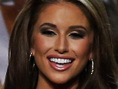 Miss Nevada USA Nia Sanchez participates in the swimsuit competition during the Miss USA pageant in Baton Rouge, La., Sunday, June 8, 2014. (AP Photo/Jonathan Bachman)