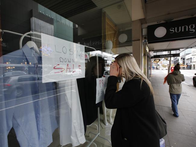 Closing down signs are on many vacant Chapel St shop windows. Picture: David Caird