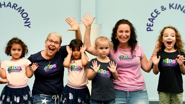 KIDS IN HARMONY; Well Being Educators Kerry Spina and Kate Martyn with Eliose and Grace Davison 4, Ella Church 3 and Theo Penna 4. Picture: Alix Sweeney