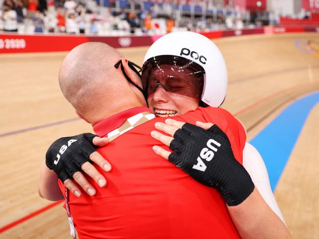 US rider Jennifer Valente is congratulated by her coach after winning gold in the omnium points race. Picture: Getty Images