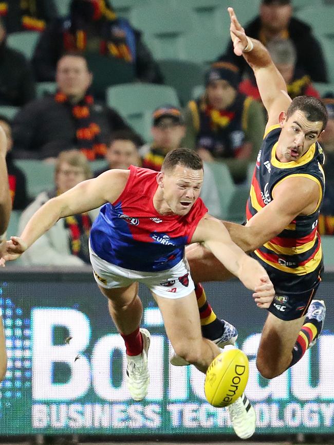 Melbourne’s Steven May battles Taylor Walker. Picture: Sarah Reed