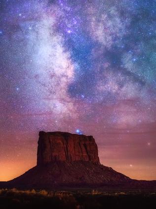 Monument Stars © Albert Dros Despite being taken during the Lunar Eclipse of 2015 the photographer actually didn't shoot the moon, but took the opportunity to capture the amazing dark sky that presented itself. Coming from a country (the Netherlands) with so much light pollution, this marked the first time the photographer had seen the Milky Way so clearly. The red glow in the sky is from the extraordinary atmosphere during the Lunar Eclipse, and the photographer remarked that it was, ‘An experience I will never forget.’ This shot is a panorama comprised of 3 vertical shots. Monument Valley, United States