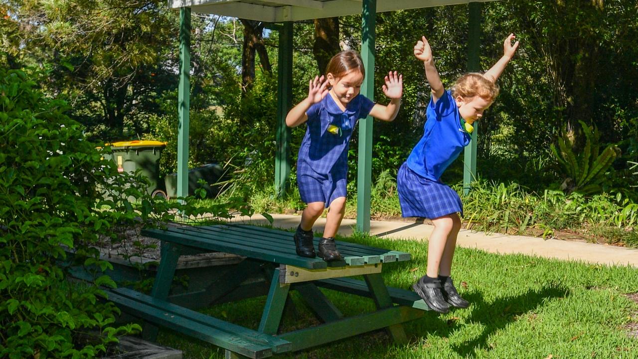 Rosebank Public School’s only two kindy students Alle and Evie jumping into their schooling.