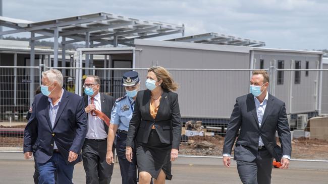 John Wagner with Annastacia Palaszczuk and Deputy Premier Steven Miles at the Wellcamp quarantine hub. Picture: Nev Madsen.