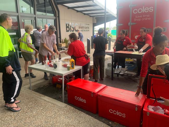 Coles put on a sausage sizzle in Ballina this week for flood affected residents, emergency crews and volunteers. Picture: supplied