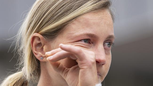 Retiring cricket star Meg Lanning wipes away a tear as she speaks to the media. Picture: Getty