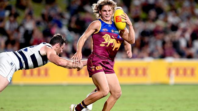 Will Ashcroft shrugs off Patrick Dangerfield. (Photo by Bradley Kanaris/Getty Images)