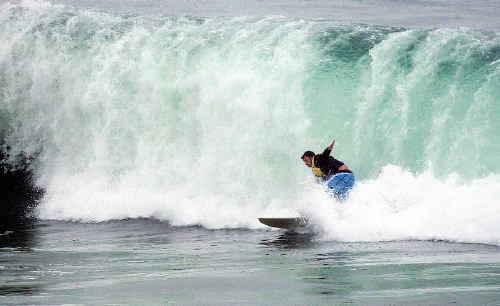 Huge swells and encroaching seas make expensive beachfront dwellings vulnerable. . Picture: Craig Sadler 