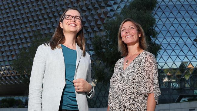 Melissa McBurnie from Brandon Capital Partners and Yvette van Eenennaam, Adelaide Biomed City general manager in front of the SAHMRI building. Picture: Sarah Reed