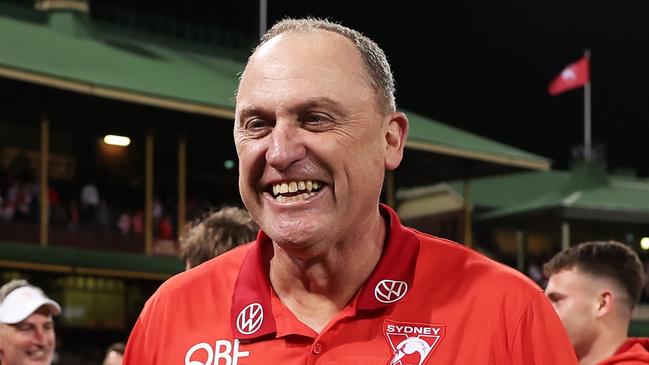 SYDNEY, AUSTRALIA - SEPTEMBER 07:  Swans head coach John Longmire celebrates victory after the AFL First Qualifying Final match between Sydney Swans and Greater Western Sydney Giants at Sydney Cricket Ground, on September 07, 2024, in Sydney, Australia. (Photo by Matt King/AFL Photos/via Getty Images)