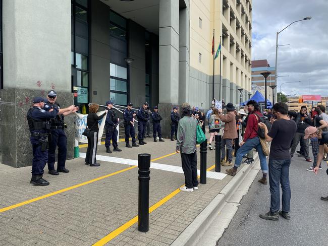 A protest has been staged outside Police Headquarters in Brisbane.