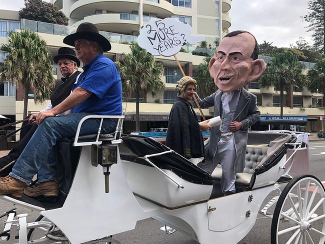 GetUp’s latest stunt involved a larger than life Tony Abbott riding a horse and cart. Picture: Ben James