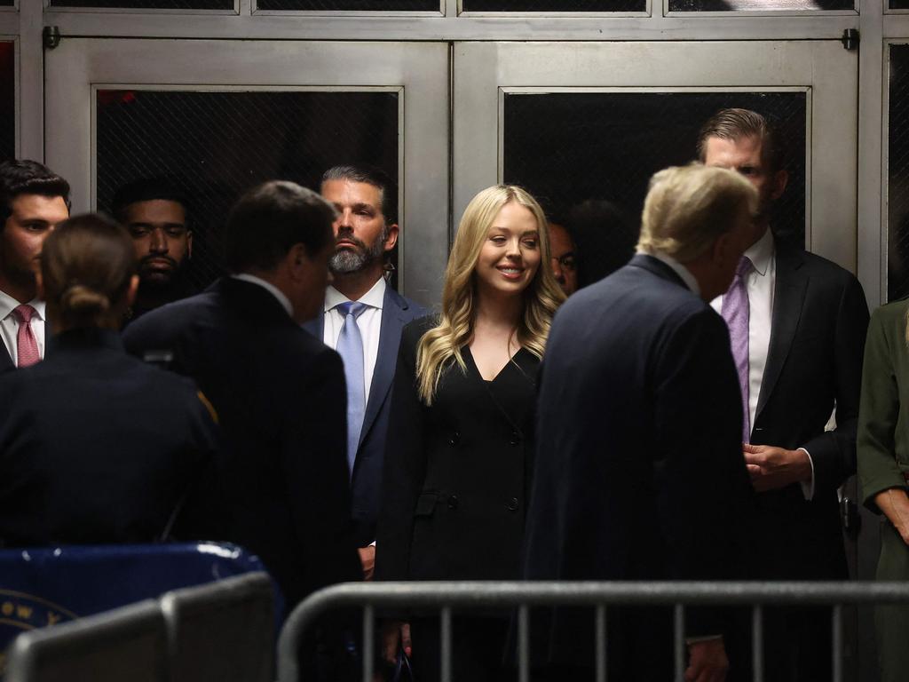 Donald Trump greets his children Donald Jr., Tiffany and Eric Trump. Picture: Spencer Platt (AFP)