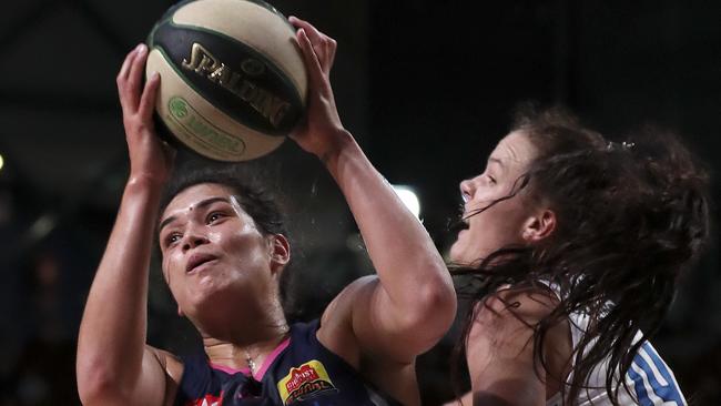 Lara McSpadden, right, is a rising star of women’s basketball.