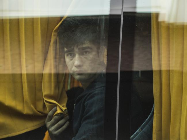 A young boy arrives on a coach. Picture: Dan Kitwood/Getty Images