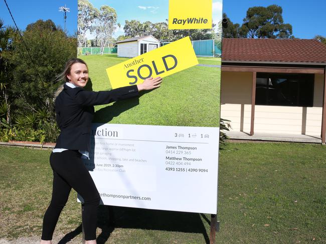 CENTRAL COAST EXPRESS ADVOCATE / AAP.First Home buyer Brittany Smith pictured outside her new home at Lake MunmorahSaturday 13th July 2019Brittany Smith is a first home buyer who recently bought in Lake Munmorah, one of the Coast's best performing growth suburbs (AAP IMAGE / MARK SCOTT)