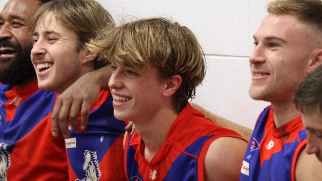 Jonty Robb (second from the right) is all smiles with his senior teammates. Picture: Darcy Robb