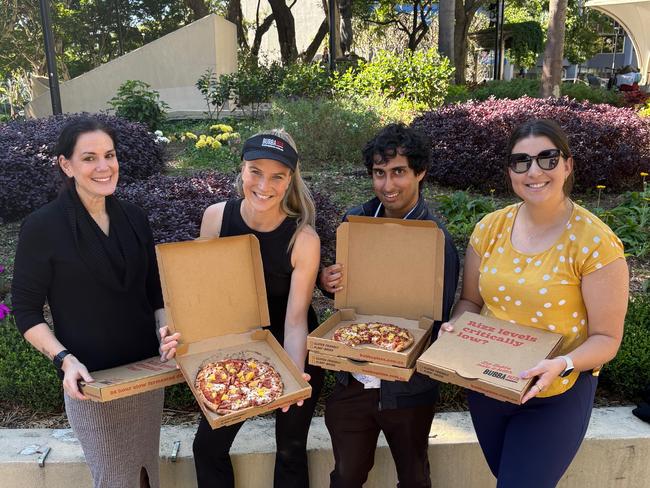 An esky full of ham and orange pizza has been handed over to a group of Brisbane friends after travelling onboard a flight from Melbourne. Picture: Supplied