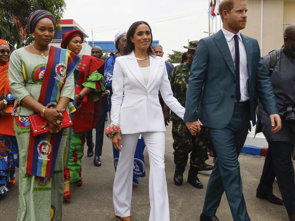 Meghan Markle wore a gold collar necklace similar to that worn by Princess Diana in 1991. Picture: Getty Images