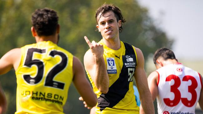 Austin Johnson celebrates a goal for Richmond, the club whom gave him a chance. Picture: RICHMOND VFL