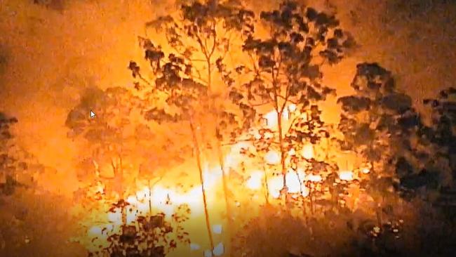 The bushfire raging in Lower Beechmont in the early hours of Saturday morning.