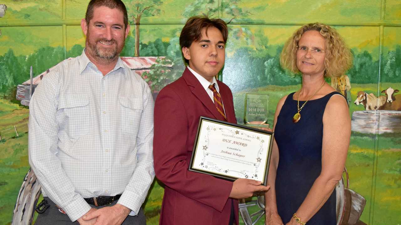 TOP AWARD: Dux Joshua Schaper with head of curriculum David Callaway and principal Beth Everill at the Biggenden State School's award night. Picture: Erica Murree