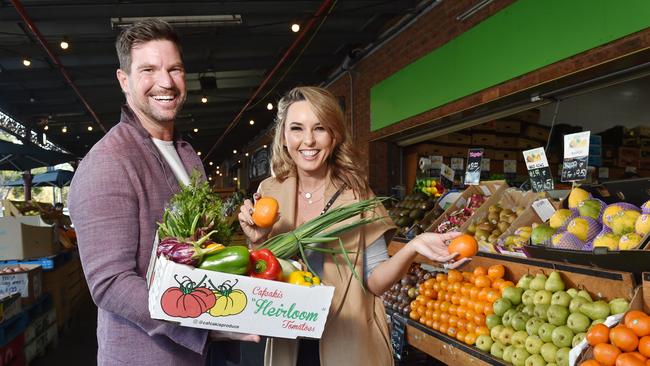 Kayla and Rohan Teasdale shopping for fruit and veggies at the South Melbourne Market. Picture: Nicki Connolly