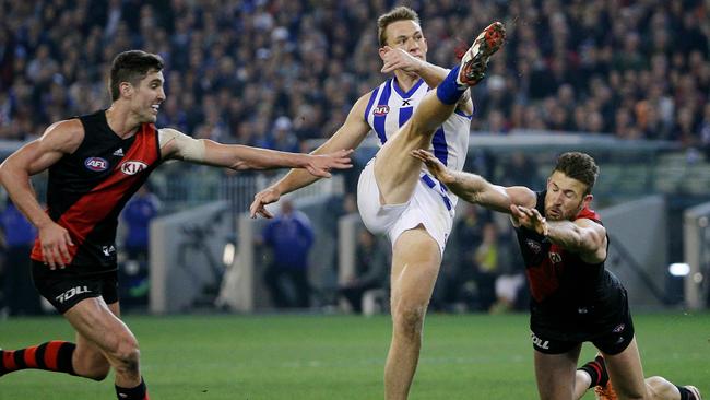 Drew Petrie kicks the goal to put North Melbourne in front. Picture: Colleen Petch