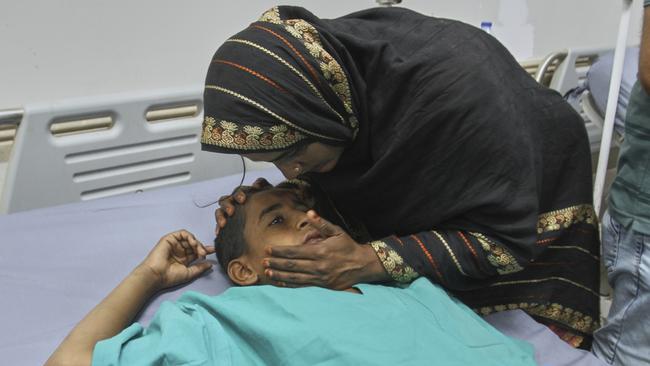 A mother comforts of her child injured in an Indian missile attack, at a hospital in Bahawalpur, Pakistan's Punjab province. Picture: AP Photo