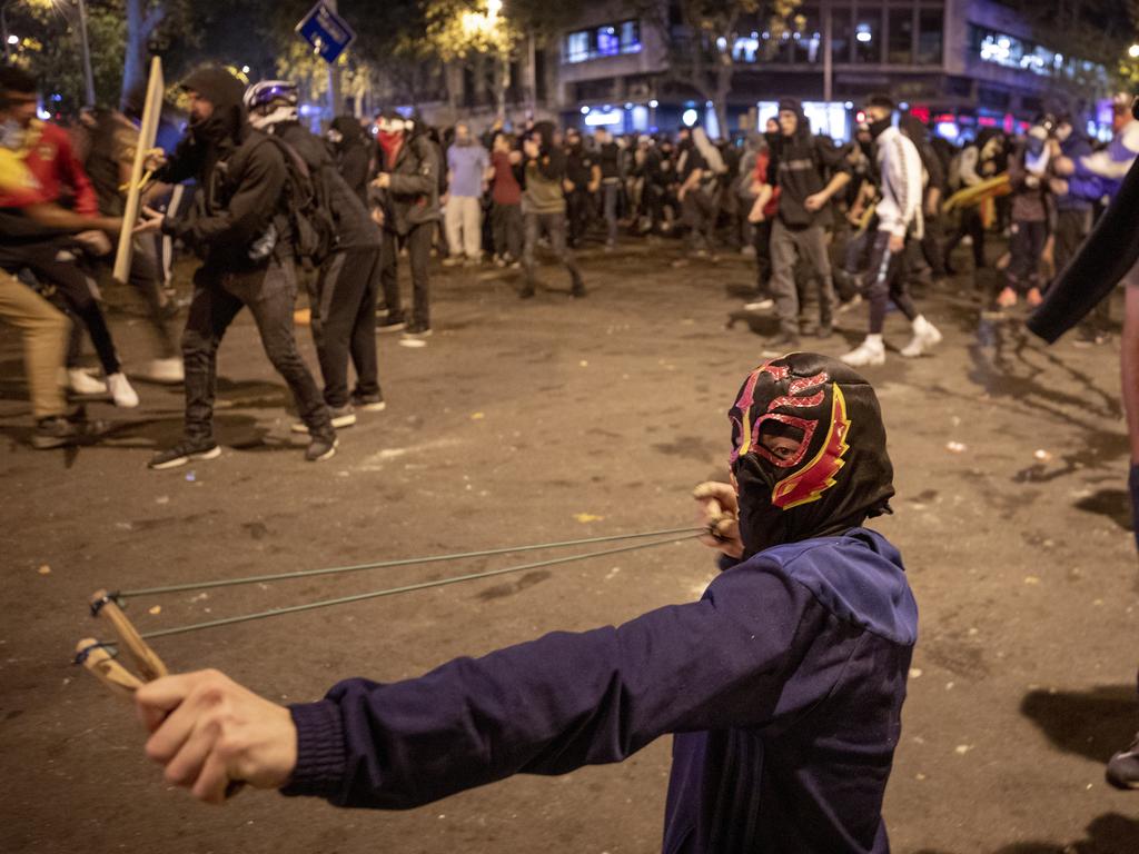 Mass protests were seen on the city’s streets. Picture: AP Photo/Emilio Morenatti