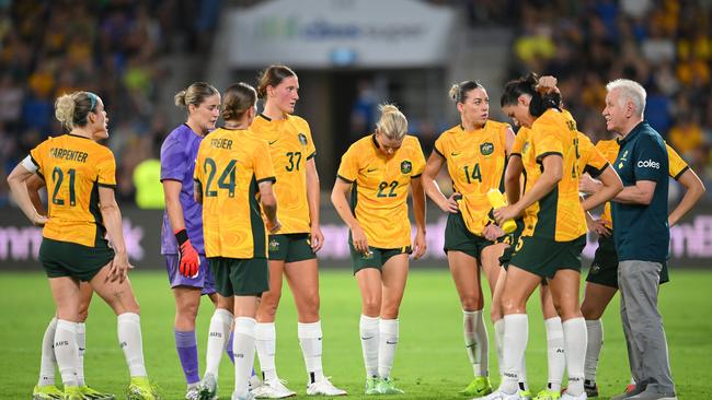 GOLD COAST, AUSTRALIA - DECEMBER 01: Tom Sermanni, Interim Head Coach of Australia talks to his players during the International Friendly match between the Matildas and Brazil at Cbus Super Stadium on December 01, 2024 in Gold Coast, Australia. (Photo by Matt Roberts/Getty Images)