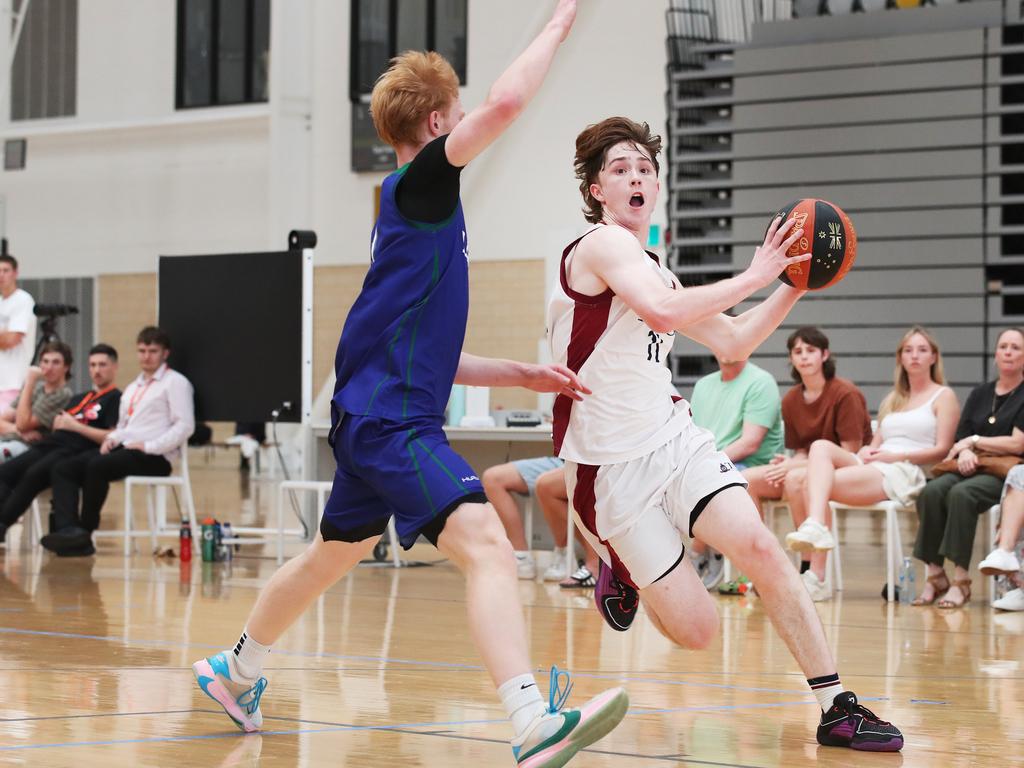 Basketball Australia Schools Championships at Carrara. Mens open final, Lake Ginninderra College Lakers V TSS (in white). Tss's Jack Foley shows his speed in the final. Picture Glenn Hampson