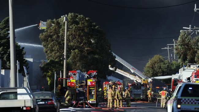 Fire crews respond to a factory fire in Campbellfield. Picture: Andrew Henshaw