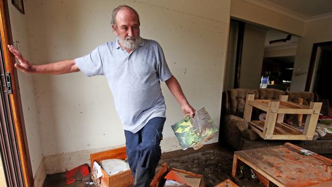 Residents of the small village of Telegraph Point north of Port Macquarie return to their destroyed homes. Milton Mitchell returns to his house. Picture: Nathan Edwards