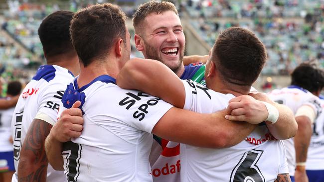 Warriors players celebrate victory after the round three NRL match between the Canberra Raiders and the Warriors at GIO Stadium (Photo by Mark Nolan/Getty Images)