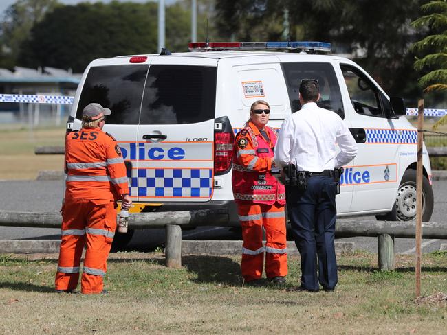 Police and SES at the scene of the gang fight at Zillmere. Pic Peter Wallis